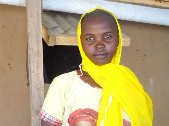 Girl with yellow scarf in Cameroon