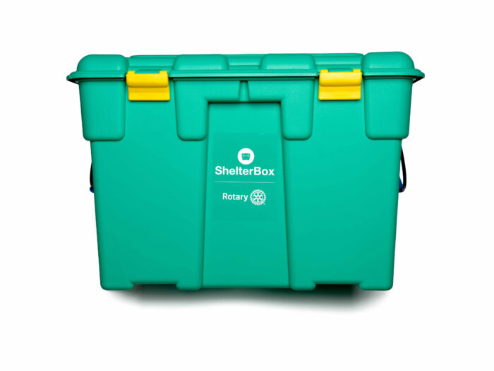 Green ShelterBox containing emergency shelter and essential aid items