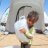 Syrian boy holds water carrier humanitarian aid