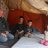 A father with his 3 children inside a tent in Syria