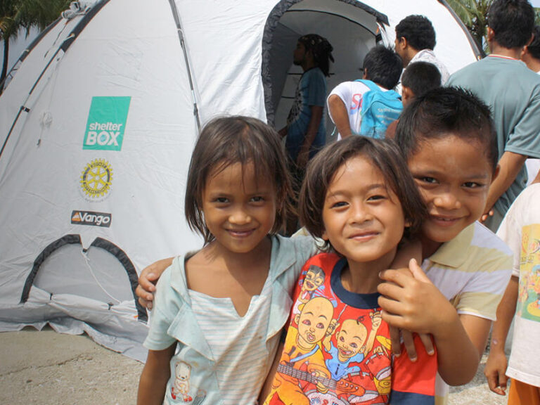 Children in front of ShelterBox tent