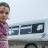 Young girl collects humanitarian aid in refugee camp Syria