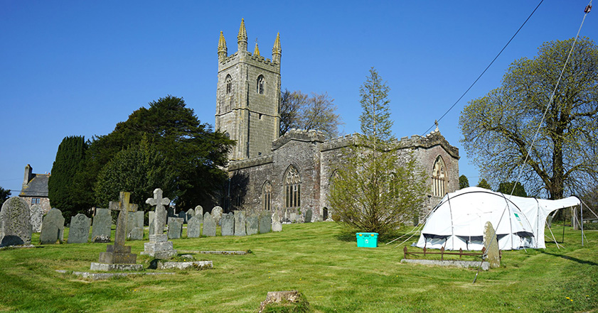 Church with a tent in the grounds