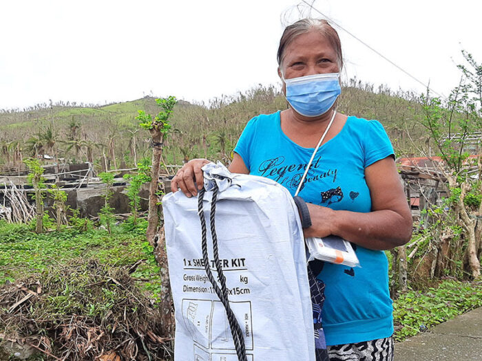 woman in philippines with shelter kit