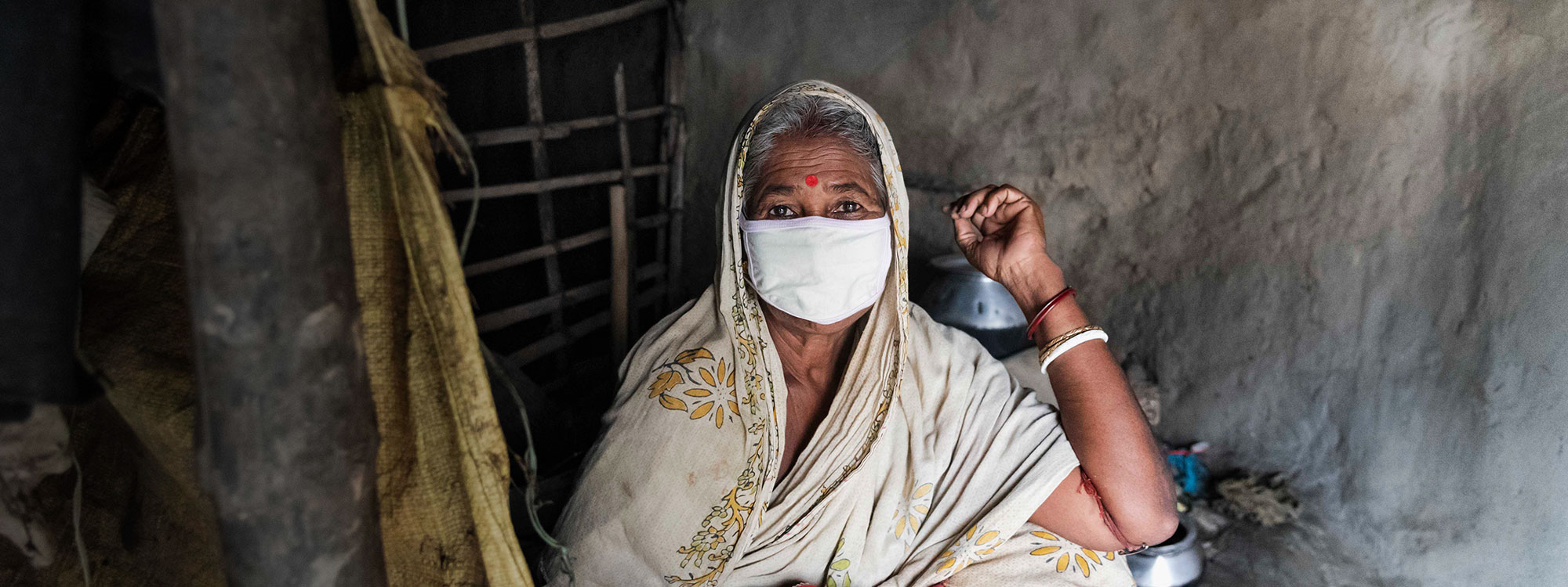 woman wearing facemask in india