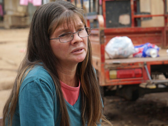 Mirta, a lady wearing glasses in Paraguay