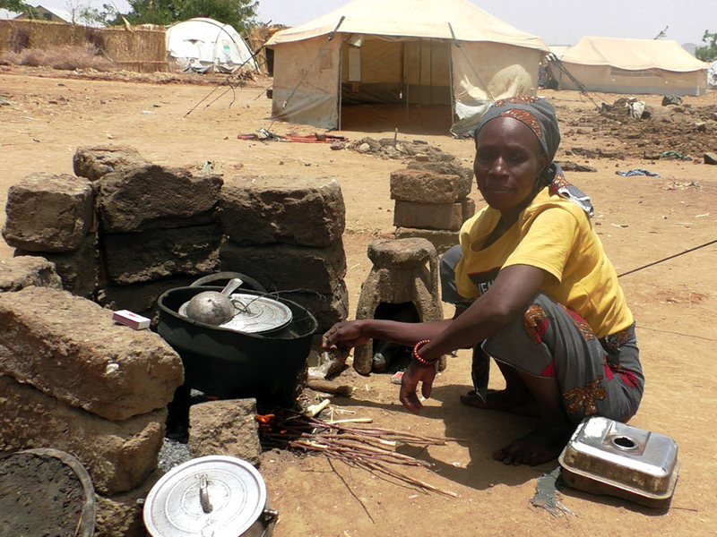 woman cooking in cameroon