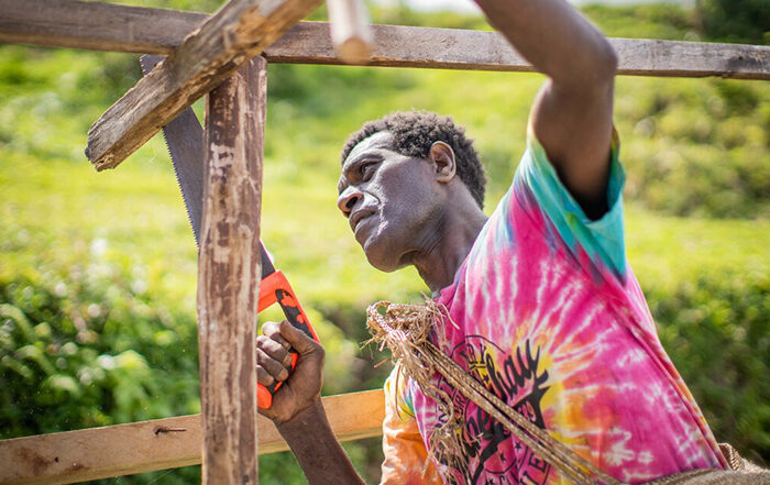 Man building a shelter on Vanuatu