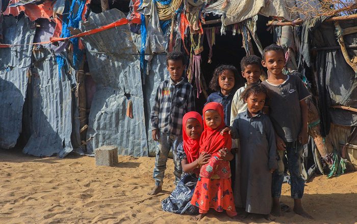 Children outside a temporary shelter in Yemen