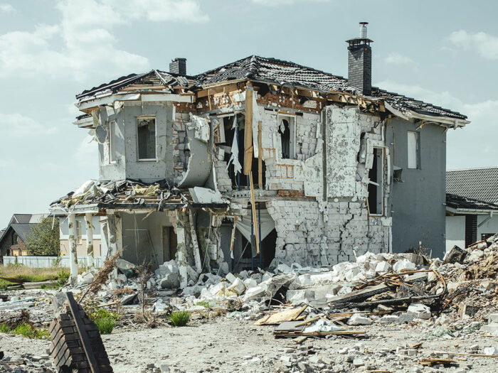 Two storey house damaged by shelling in ukraine