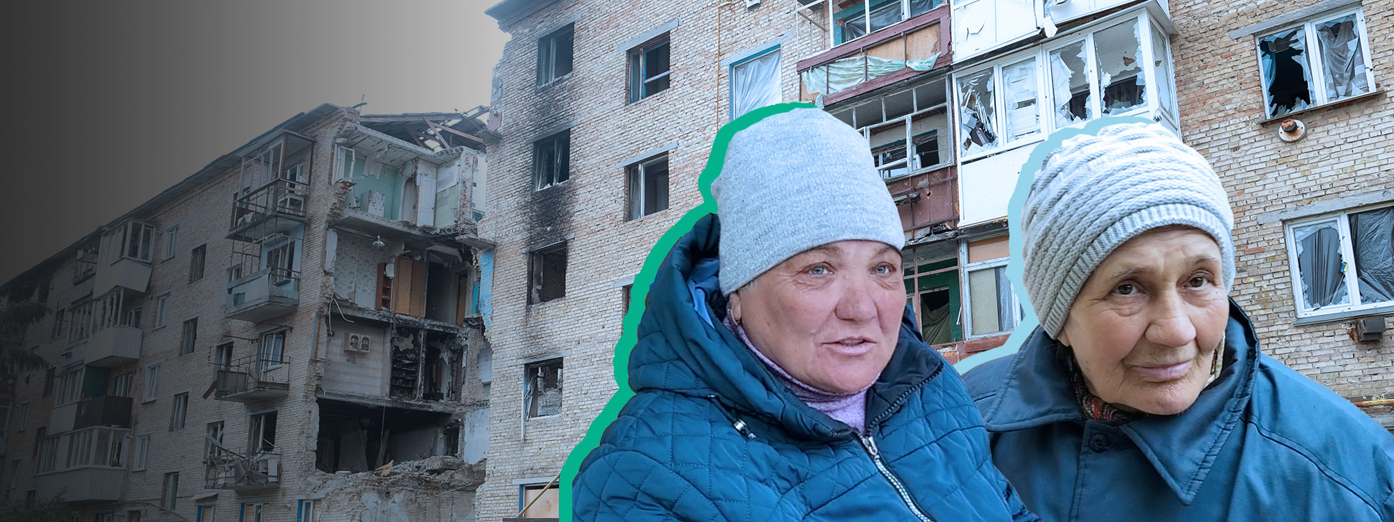 Two Ukrainian women in winter clothing, background is a bombed apartment building