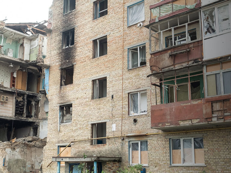 An apartment block damaged by shelling in Ukraine
