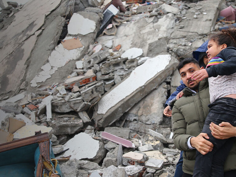 A child is rescued under rubble after earthquake hits Turkey