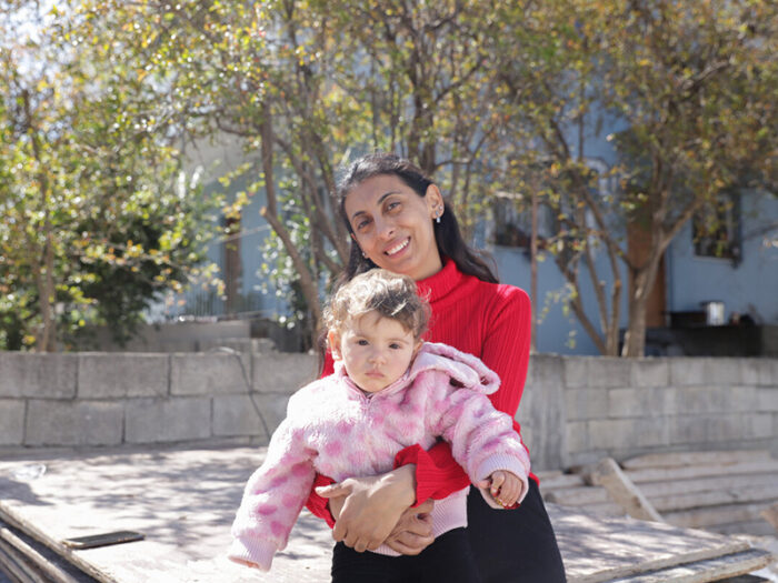 Woman holding a little girl