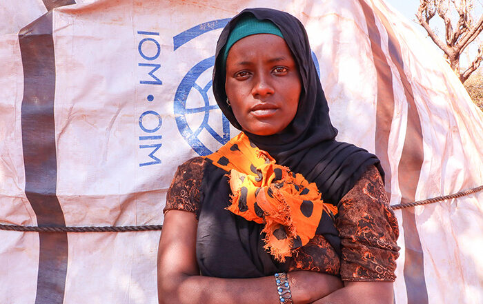 Woman outside a shelter in Ethiopia