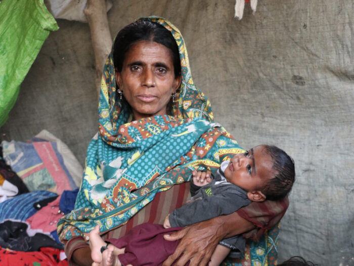 Woman holding a baby in Pakistan