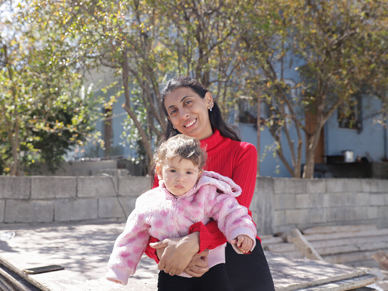 Woman holding a baby in Turkey