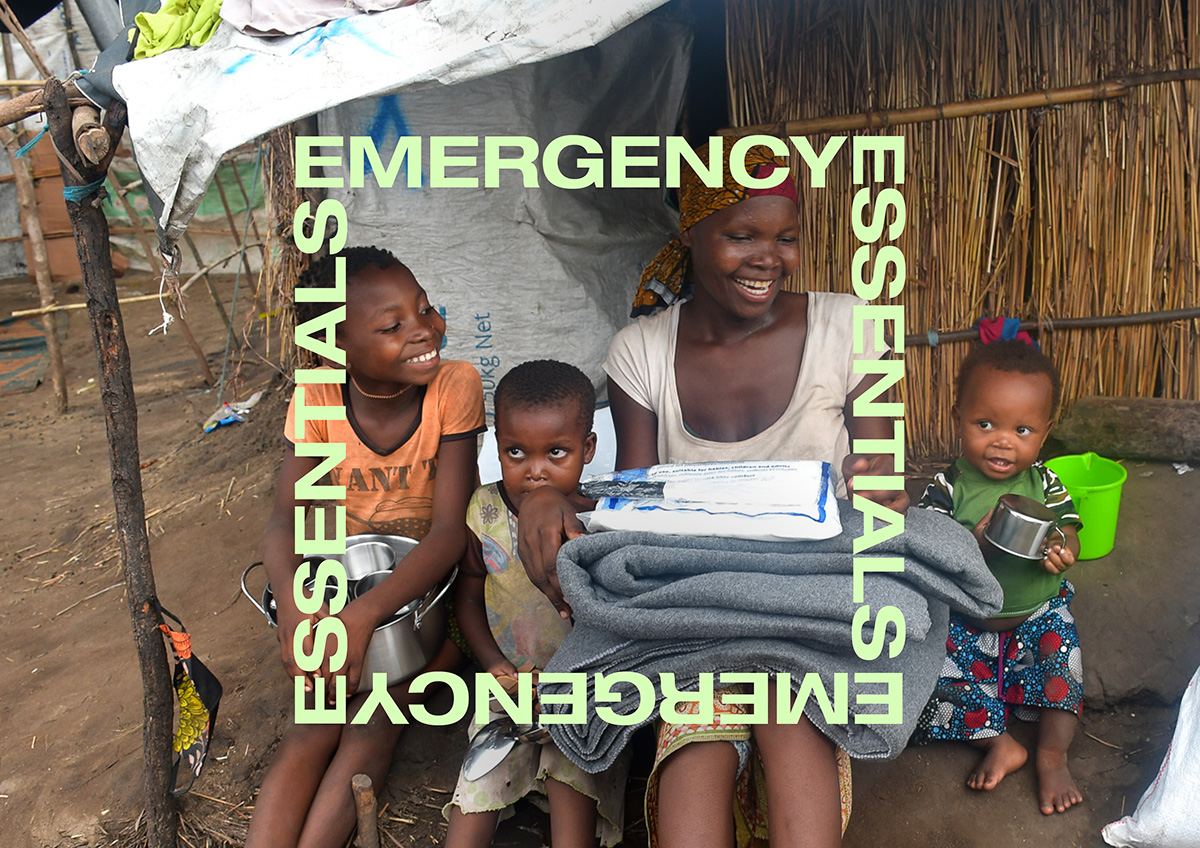 Woman and children holding aid with a square around them formed of the Words Emergency Essentials
