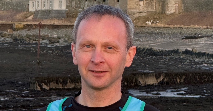 Thurso resident Derek Sinclair in his ShelterBox running jersey.