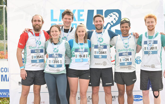 Group posing before running the Lake Garda marathon to fundraise for ShelterBox