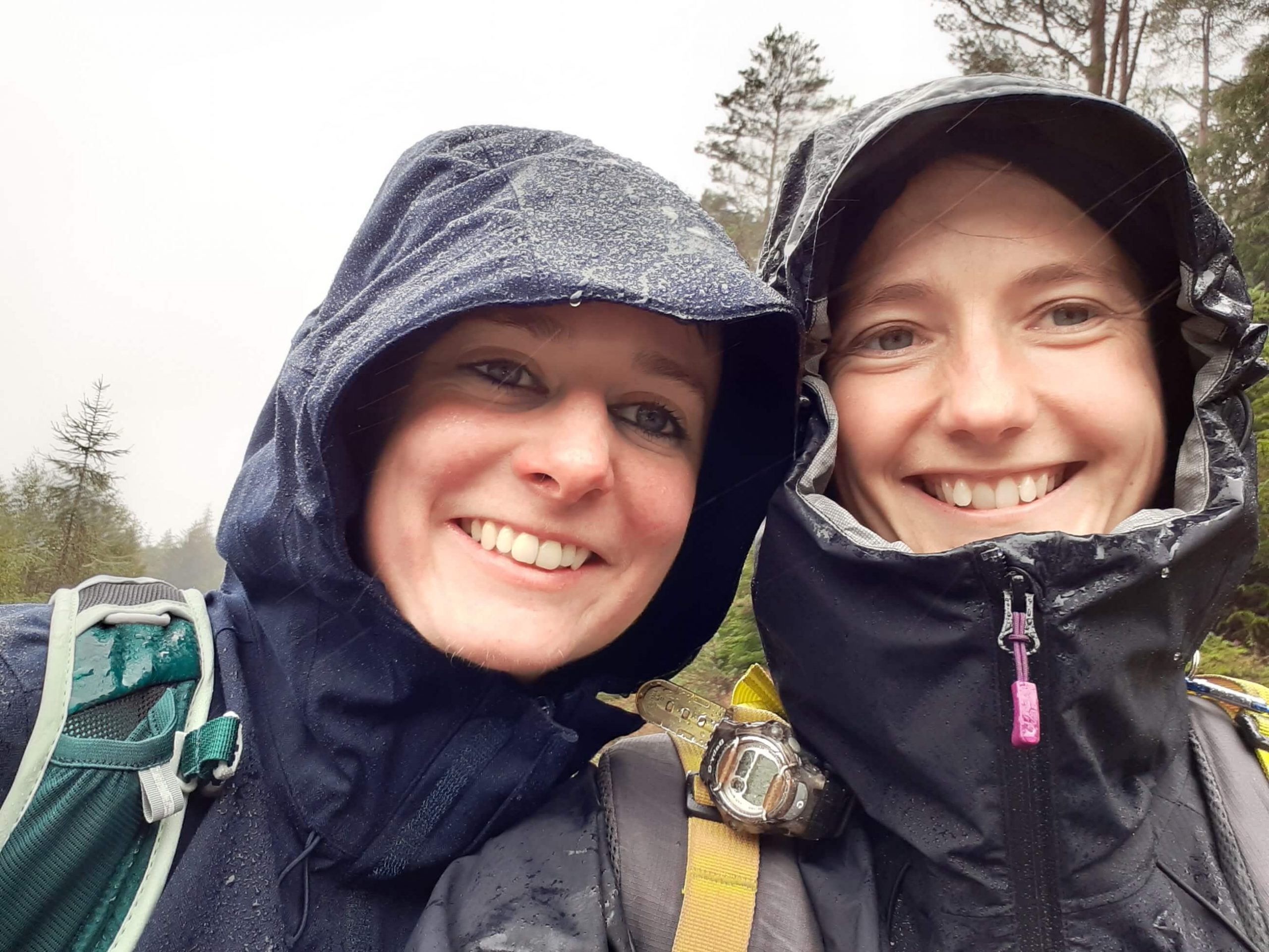 Supporters Meg and Alice wearing rain jackets while doing the virtual LEJOG hike