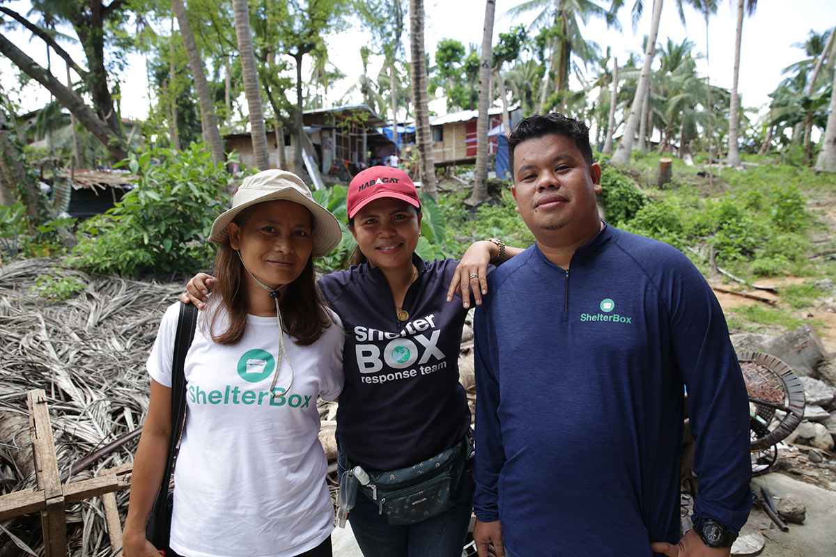 Two women and a man in the Philippines