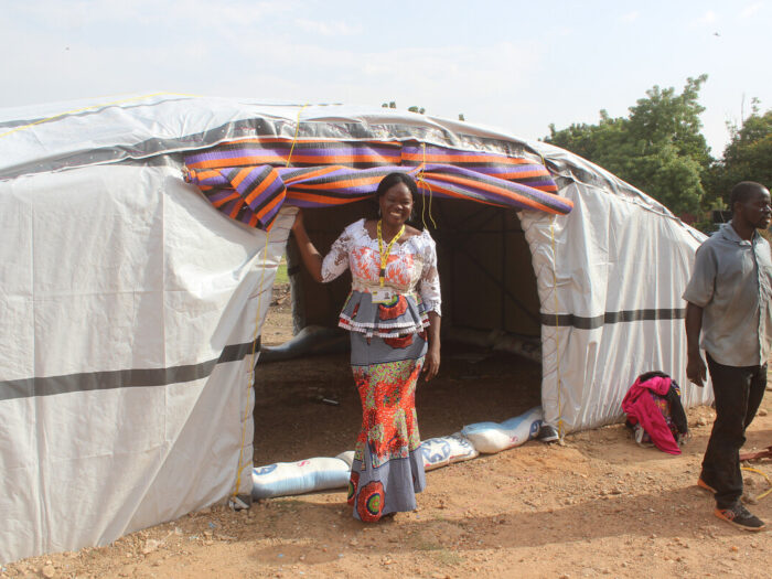 Woman outside Sahelian tent in Burkina Faso