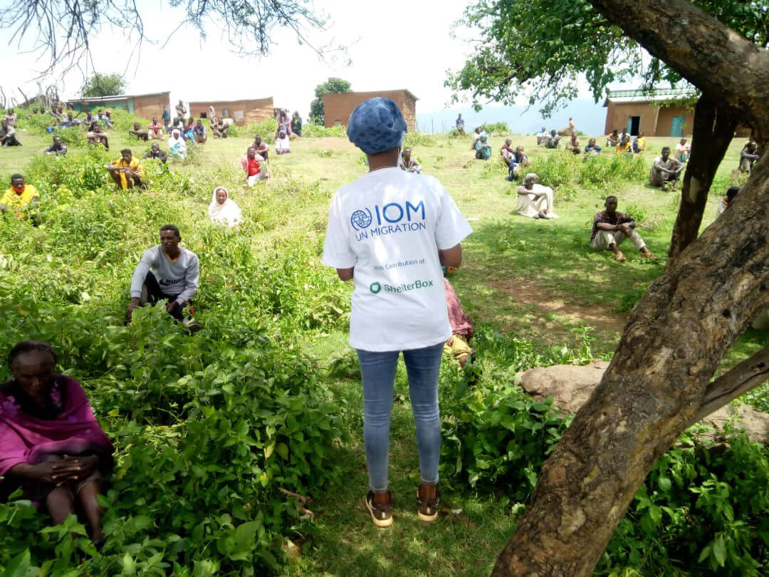 IOM staff and people demonstrating social distancing in Tigray, Ethiopia.