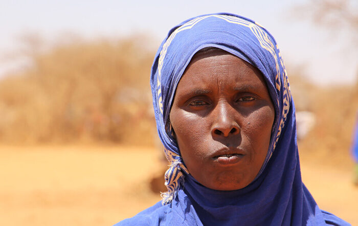 Woman wearing purple headscarf in Somaliland