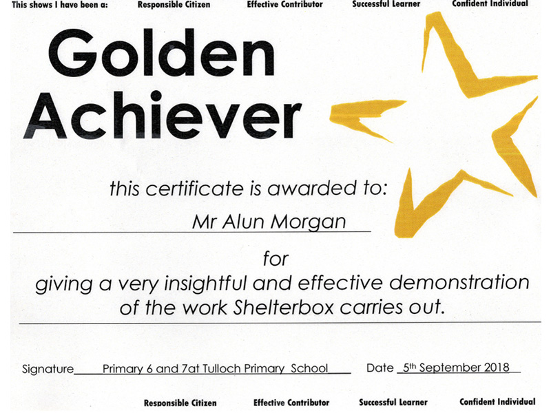 Golden Achiever certificate for volunteer Alun Morgan from Tulloch Primary School after giving a talk on ShelterBox