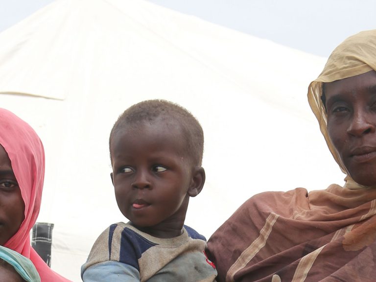 Woman and three children in Chad