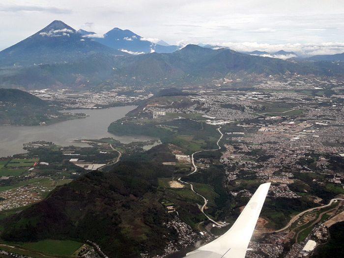 View over the landscape in Guatemala, including the Fuego volcano