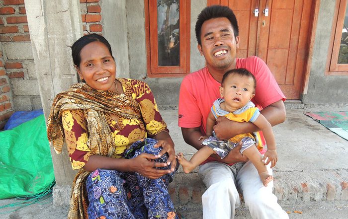 Man, woman and child in Indonesia