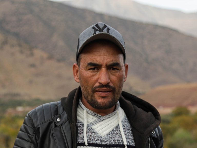 Man in front of Atlas Mountains in Morocco