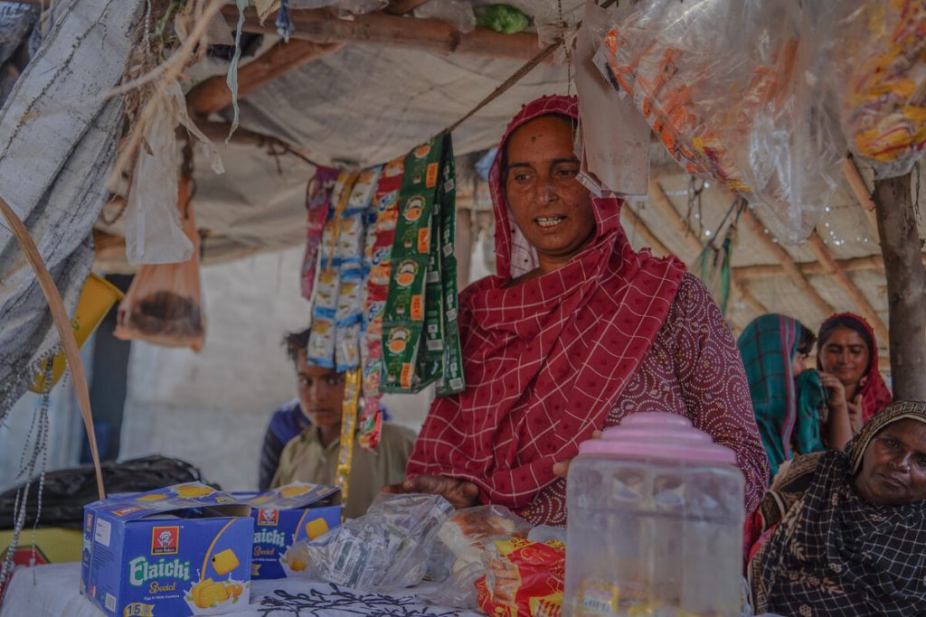 Woman in a tuck shop in Pakistan