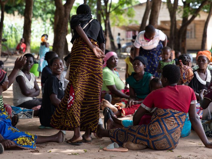 People sitting on the floor in Malawi