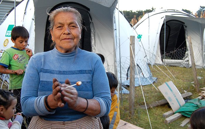 Woman outside tent in Guatemala