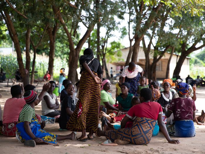 People sitting on the floor in Malawi