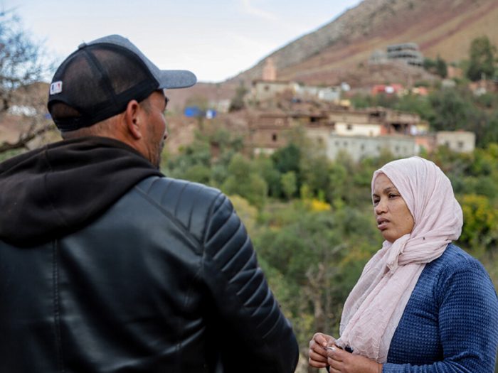 Man and woman talking in the Atlas Mountains in Morocco