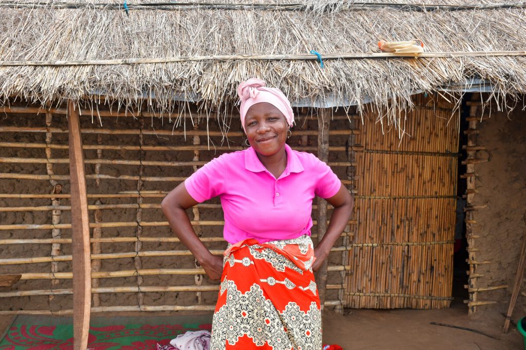 Woman standing outside a building in Mozambique