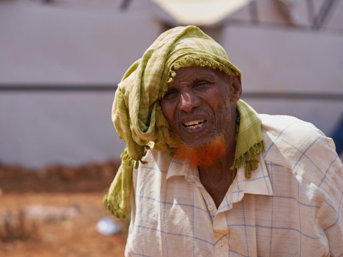 Man wearing a green hat in Somalia