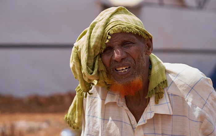 Man wearing green head scarf in Somalia