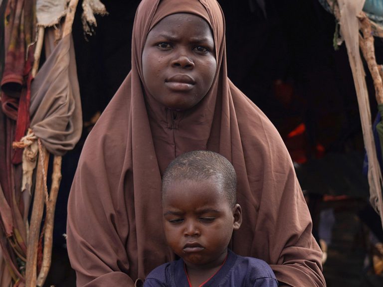 Woman and child outside a shelter in Somalia
