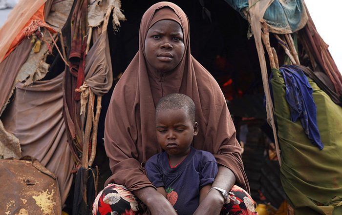 Woman and child outside a shelter in Somalia
