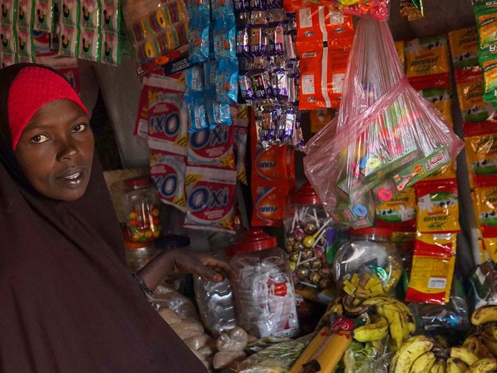 Woman inside a small shop in Somalia