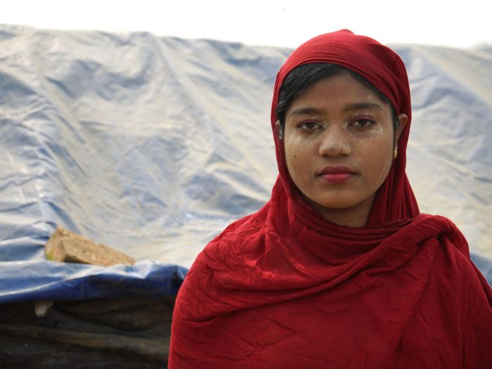 Young woman wearing red head scarf