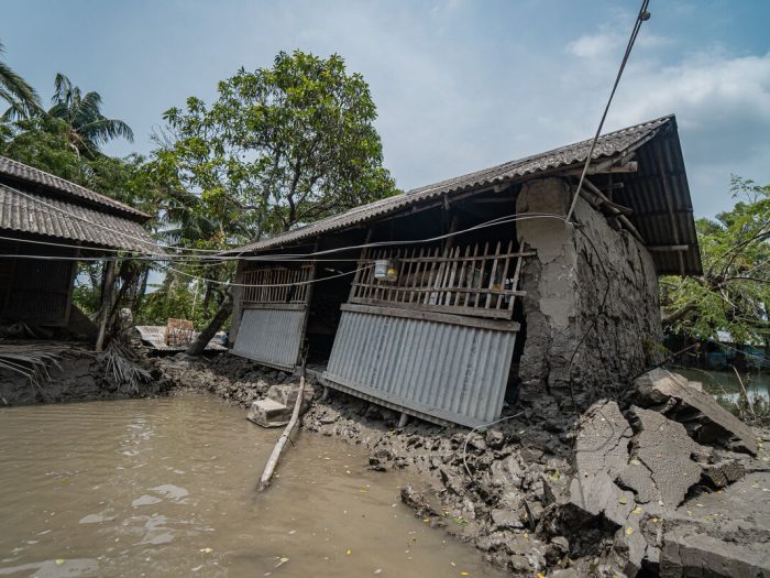 Building collapsing in Bangladesh due to flooding after Cyclone Remal