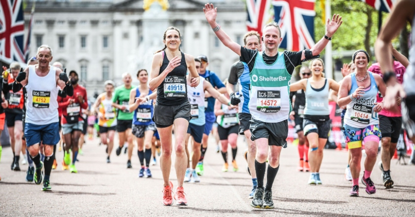 Man wearing ShelterBox vest among runners in London Marathon