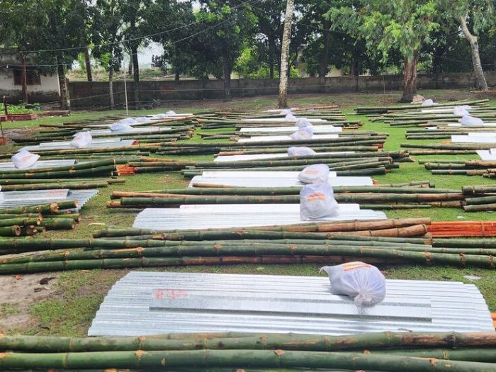 Piles of wood and metal to help repair buildings and build shelters in Bangladesh