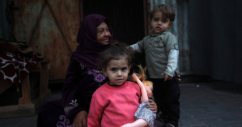 Woman and two young children in Gaza